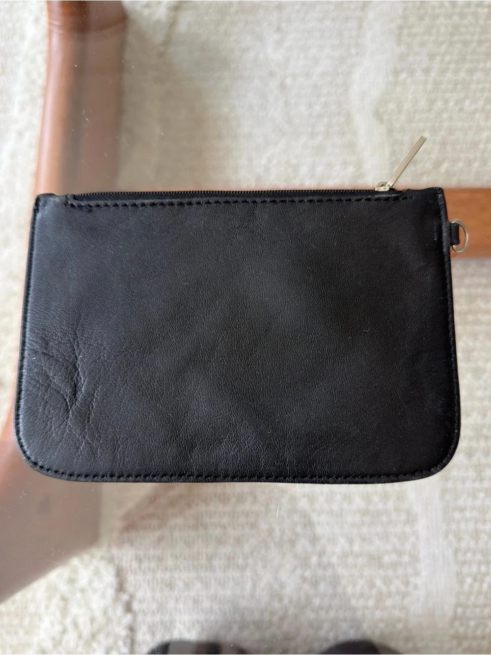 CHANEL CC Black Leather Zip Wallet with Branded Silver Pull.